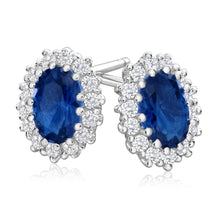 Load image into Gallery viewer, Sterling Silver Cubic Zirconia Blue Border White Stud Earrings