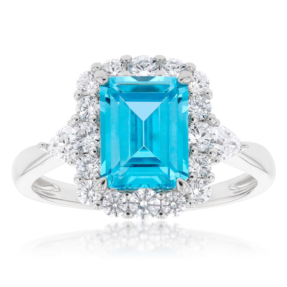 Sterling Silver Rhodium Plated White & Aquamarine Cubic Zirconia Emerald Cut Ring