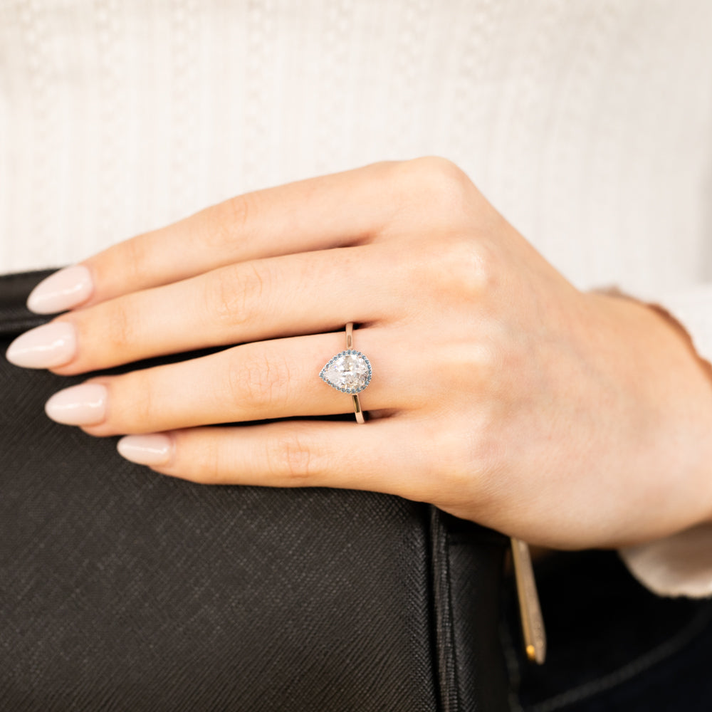 Sterling Silver Rhodium Plated Pear Shaped Blue And White Zirconia Ring