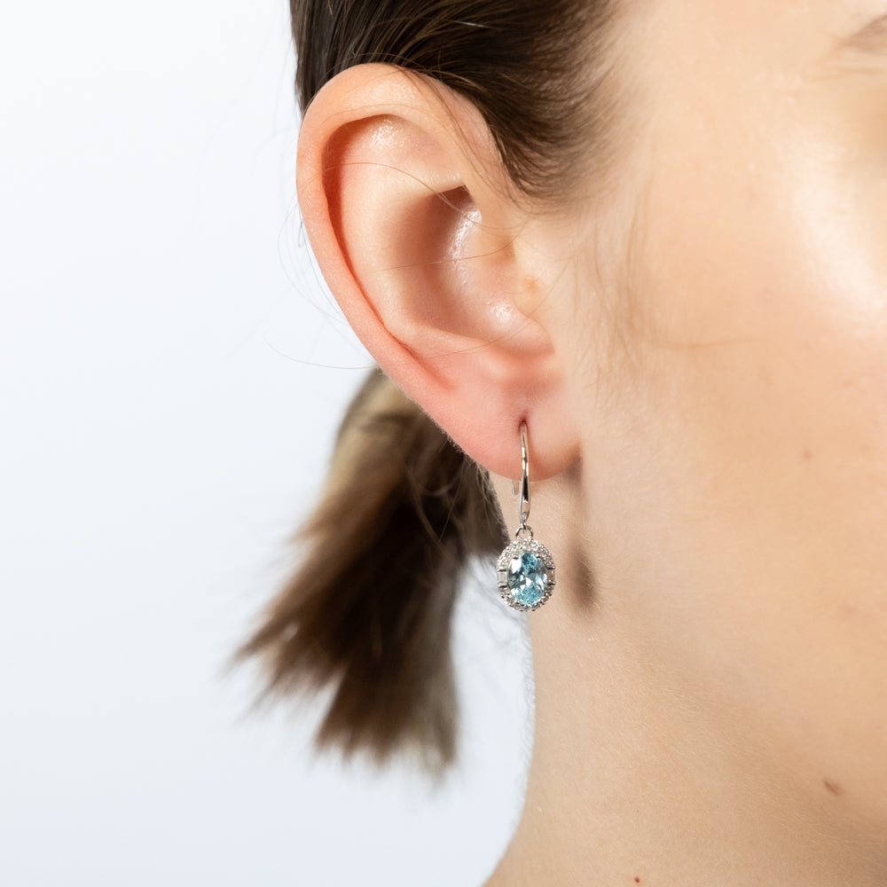 Sterling Silver Rhodium Plated White And Aquamarine Cubic Zirconia Oval Drop Earrings